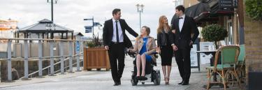 inspirational|395.jpg|Invacare TDX SP NB power wheelchair in motion, the marina