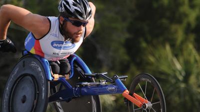 benefit|OSR.jpg|Sport wheelchair Top End Eliminator man on a race