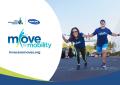 Two people running for the Move for Mobility event. 