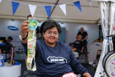 One of Invacare's superheros Nargis after completing the Tri