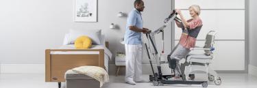 inspirational|isa-standard1600x550.jpg|The Invacare ISA standard stand assist lifter, patient and carer in bed transfer