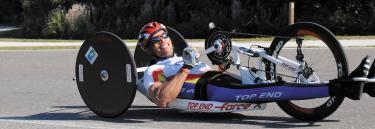 inspirational|DSC_5708.jpg|Sport wheelchair Top End Force RX white frame man on a street