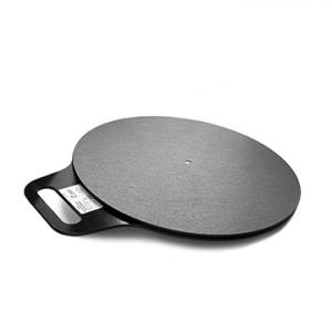 Circular transfer disc with a smooth rotating platform and side handle, designed to assist with standing pivots and patient transfers.
