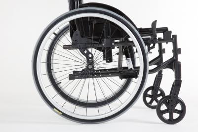 cover|ACTIONXT OF22.jpg|Manual wheelchair Invacare Action XT rear wheel position