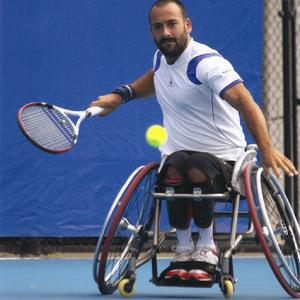 benefit|T5-TENNIS-BE05.jpg|Sport wheelchair Top End T-5 7000 Series Tennis man playing tennis