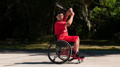 benefit|Pro 2_BE04.jpg|Sport wheelchair Top End Pro 2 man playing basketball